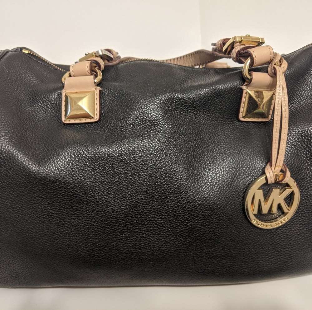 Black pebbled leather Michael Kors bag.